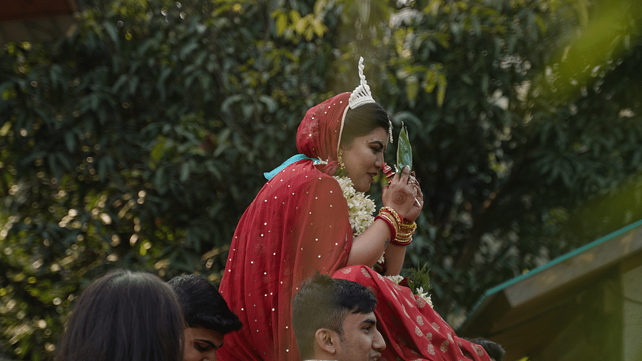 A ceremonial entry of a bride at The Sylvan Retreat, Dehradun.