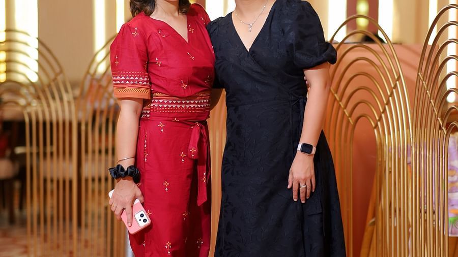 An image of two women posing at Themis Barbecue House, Ambala