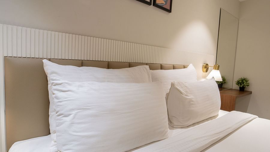 An image of a room with king size bed, bed side tables, lamps - Trance Veechika Resort, Vikarabad