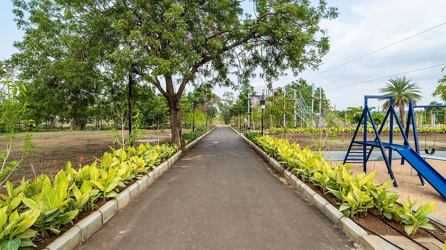 A facade image of a pitched road with trees - Trance Veechika Resort, Vikarabad