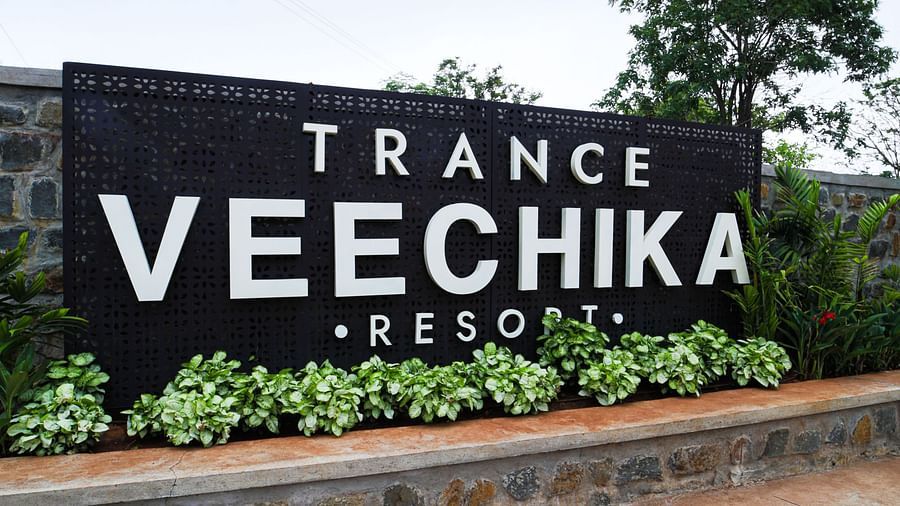 An image of a sign board with the resort's name - Trance Veechika Resort, Vikarabad