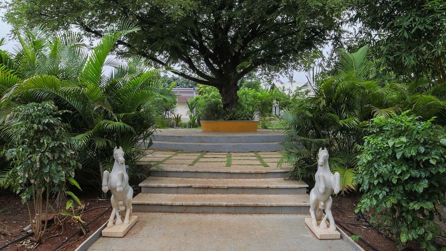 A facade image of a pathway with greenery around - Trance Veechika Resort, Vikarabad