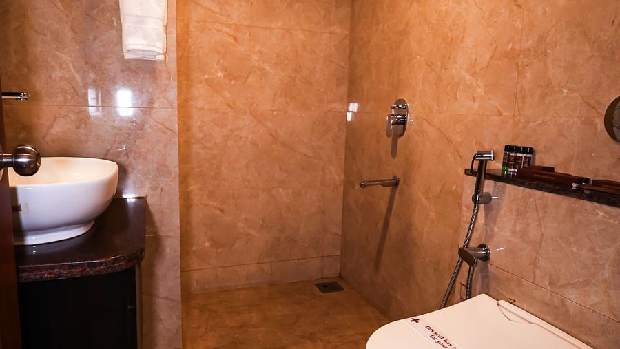 Deluxe room wasroom with modern amenities  at Vagator Downtown, Goa 