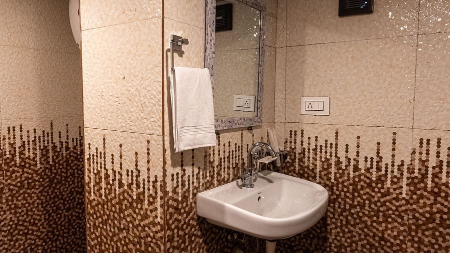 an image of a bathroom with a wash at Avianna New Mandala Hotel & Spa, Darjeeling