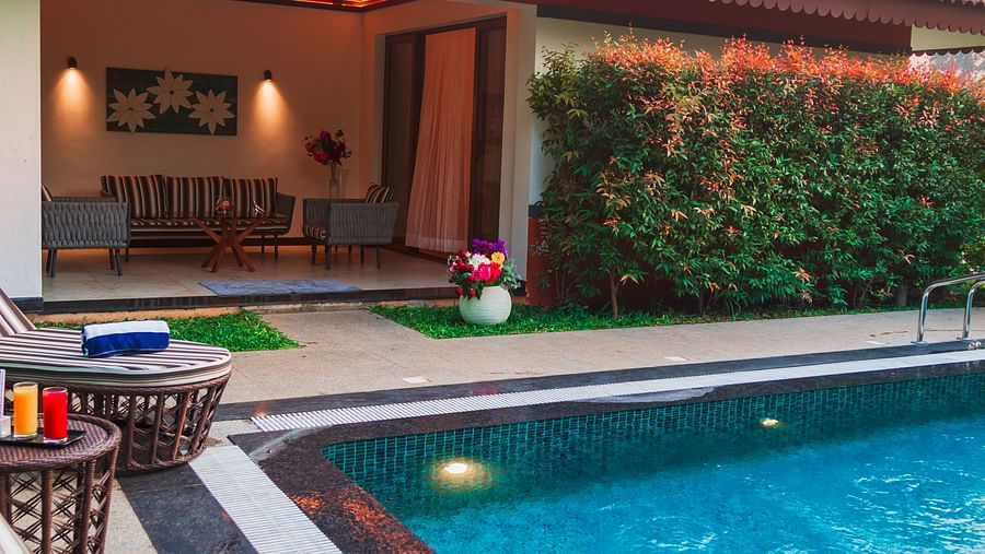 Gamyam Retreat, Kumta - Sunloungers kept near the private pool that comes with our Pool Villa room 1