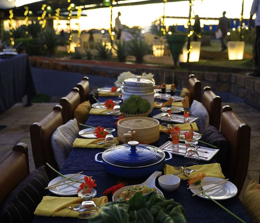 alt-text a meal laid out on an outdoor table - Polo Orchid Resort, Cherrapunji