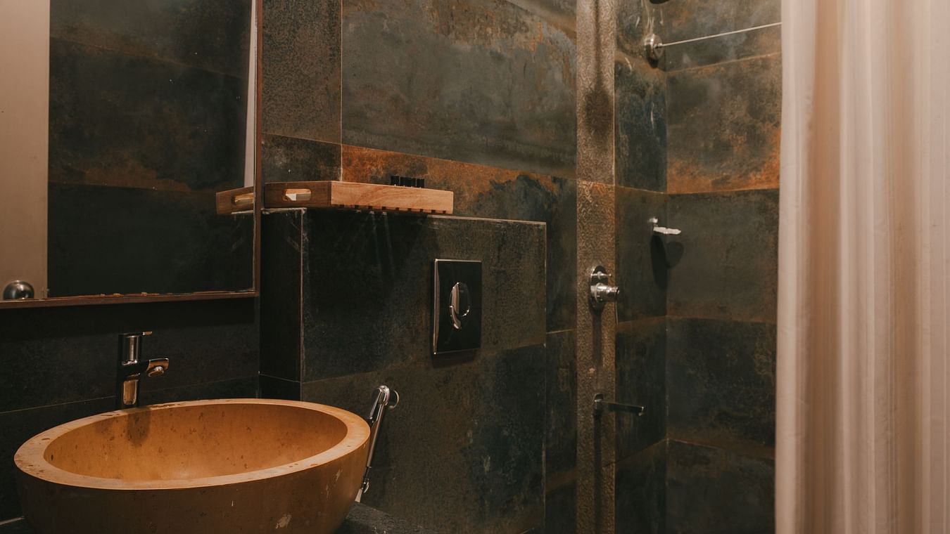 Elegant bathroom with modern fittings at One BHK Apartment, Richmonde Ananta Elite, Goa.