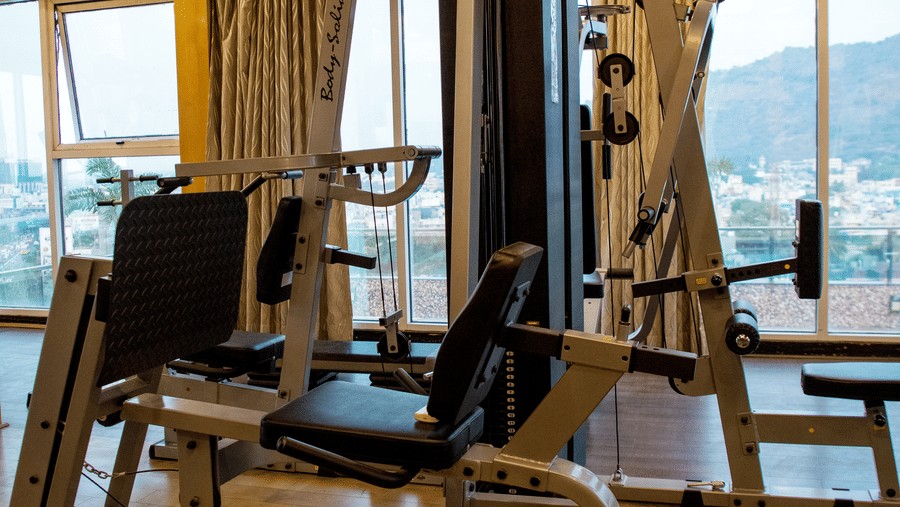 The fitness centre overlooking the city views from the huge glass windows at the Benzz Park, Vellore.