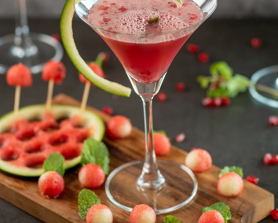 a glass of pink drink - polo floatel kolkata