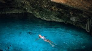 woman swimming in Cave pool