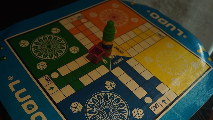 Top view of a Ludo board placed on a table