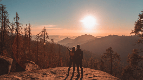 Couple watching sunrise