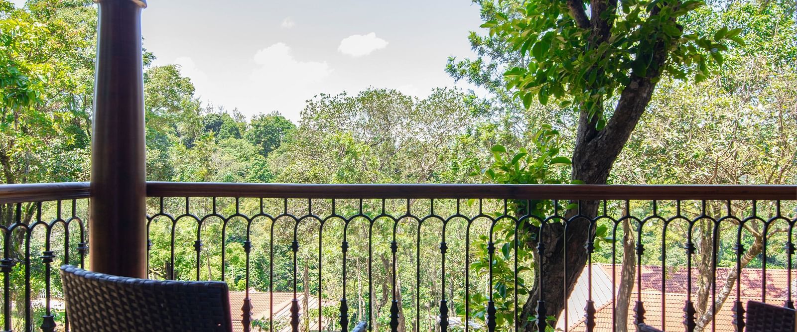balcony with chairs- Tapovana, Sakleshpura