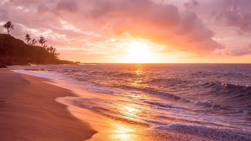 A beautiful view of waves washing the shore during sunset - Tharangambadi Places to Visit