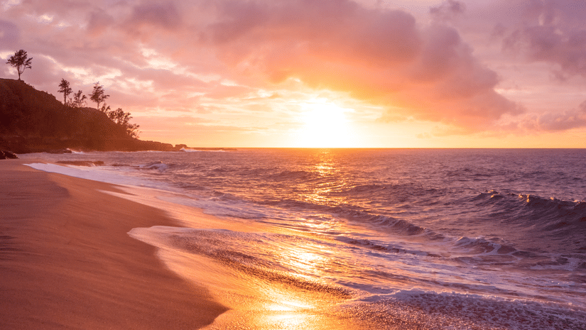 A beautiful view of waves washing the shore during sunset - Tharangambadi Places to Visit
