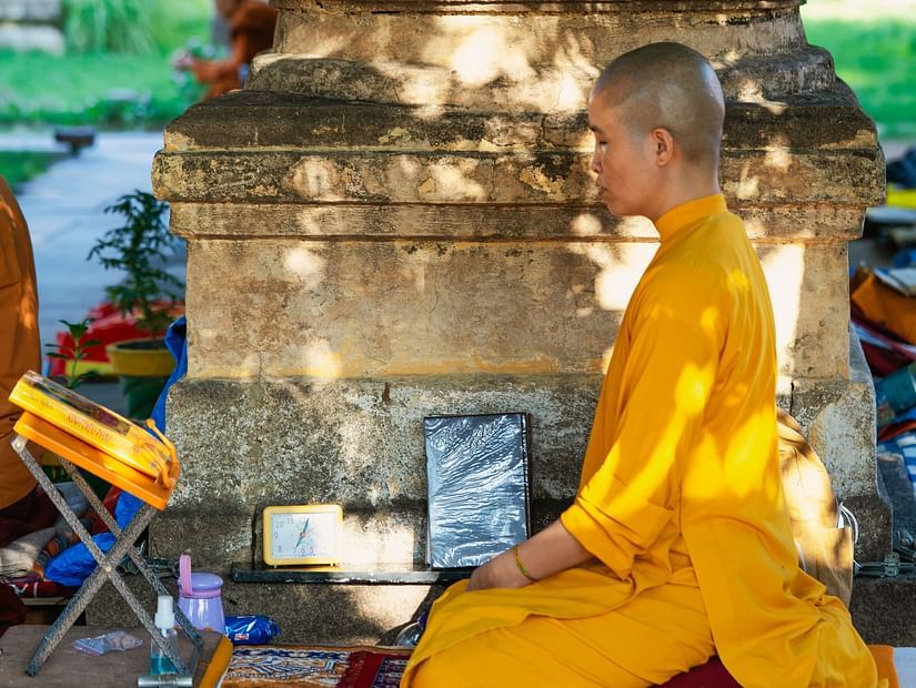 A Buddhist sitting in meditation