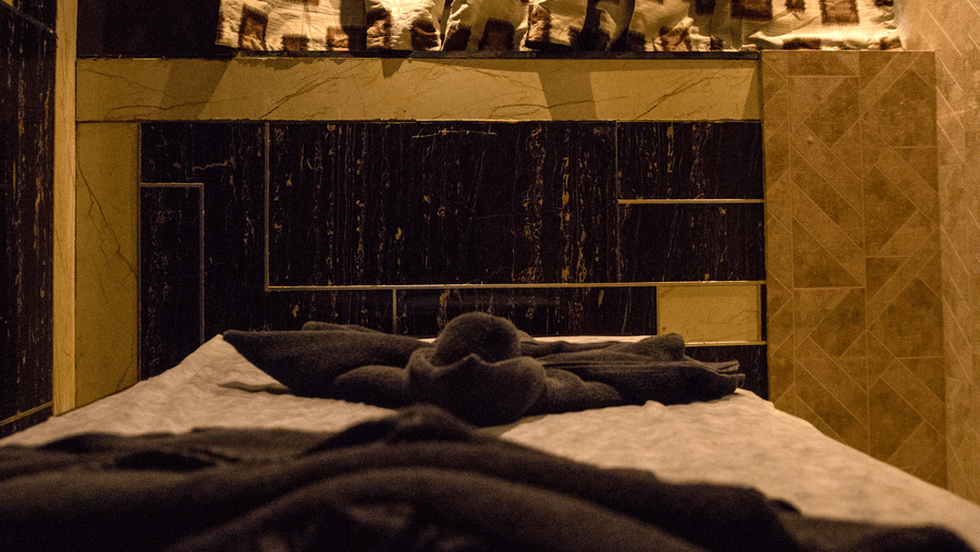 Close up shot of the spa bed at the Benzzee O2 Spa at Benzz Park, Vellore, featuring dimly lit interiors of the room.