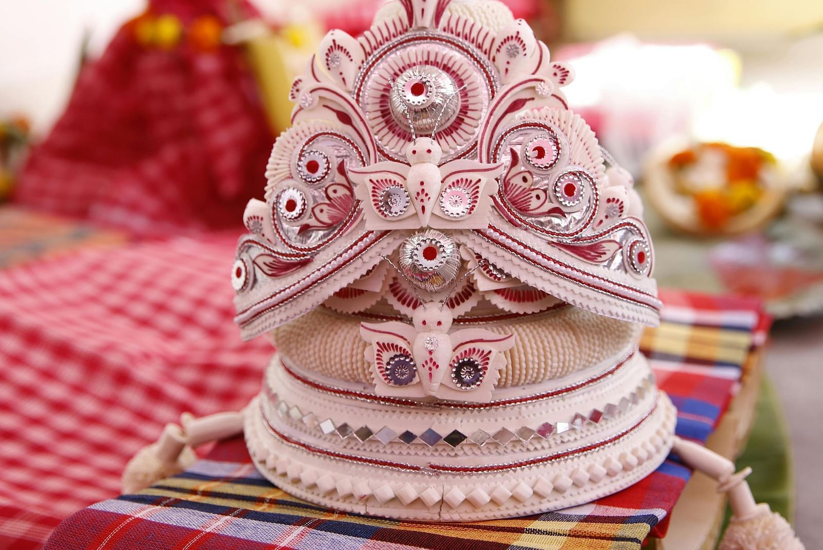 image of a traditional bengali crown for weddings handmade by local artisans with intricate details