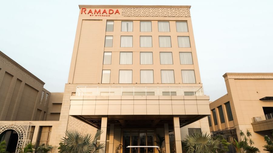 Front elevation of the Ramada by Wyndham Sonipat Murthal building during daytime