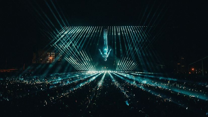 Sub-aerial view of a concert with laser lights