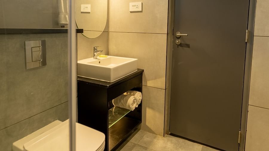 image of the bathroom featuring a commode and a wash basin at the luxury group stay villa - Darza Resorts