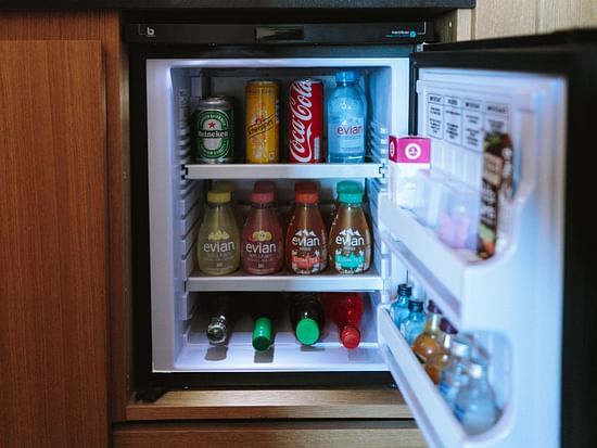 The mini-bar with drinks inside