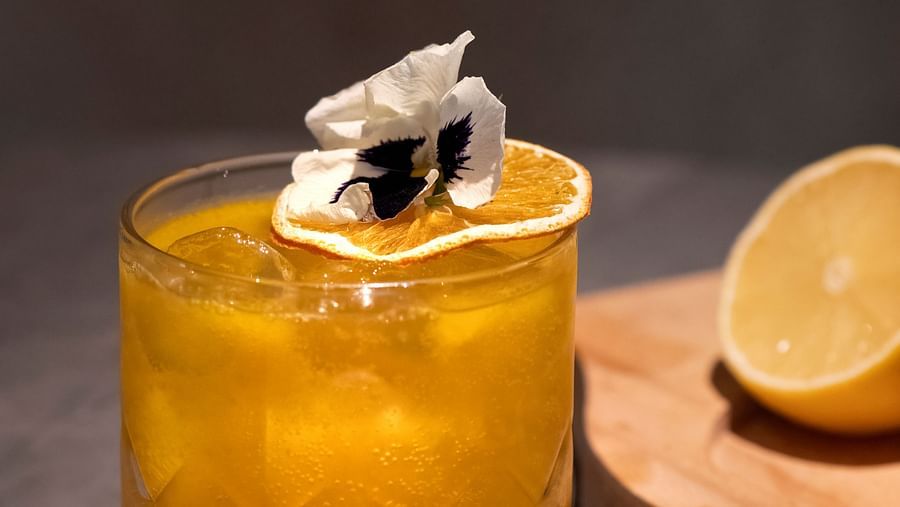 a signature fusion drink named as the king of fruits served at the aura bar - The Claridges New Delhi