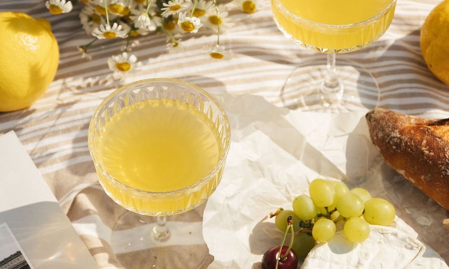 juice glasses with fruits around