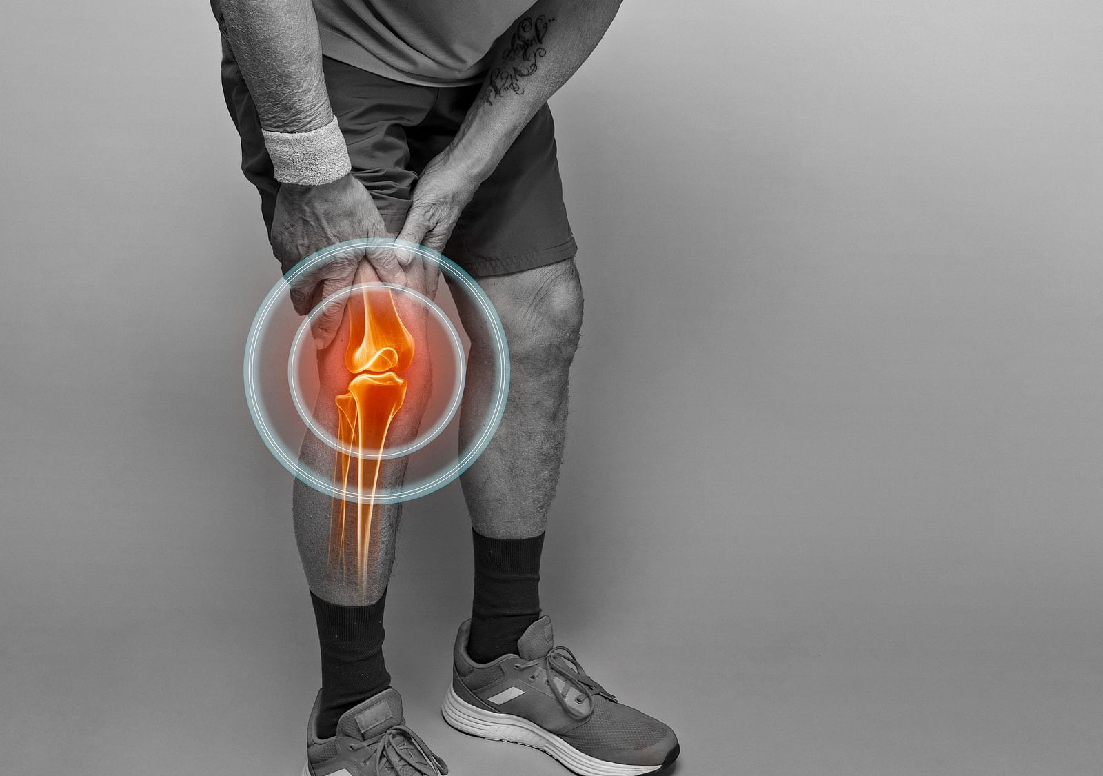 A person holding his knee showcasing Musculoskeletal Disorders - Shreyas Retreat