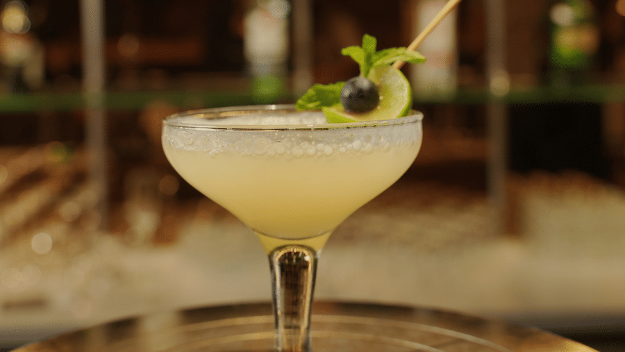 Citrine Hotel | A glass placed on a table with drinks in it.