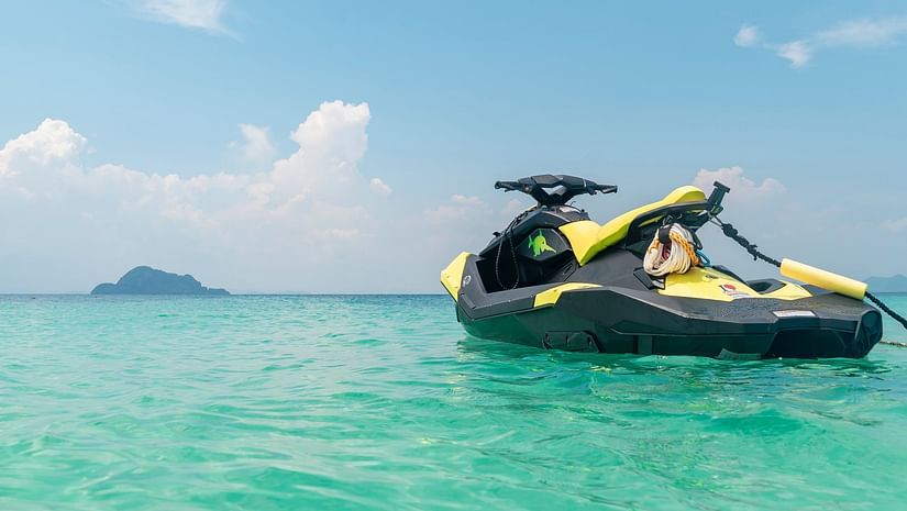 A water bike on a water body under the blue sky