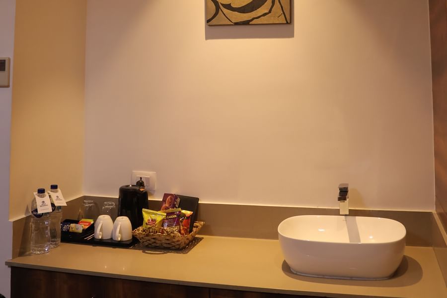 bathroom space with modern fixtures and artistic wall decor at Best Western, Vrindavan.