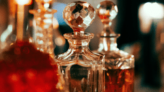 Close-up of elegant crystal glasses and candlelight creating a warm ambience - Clarks Avadh, Lucknow