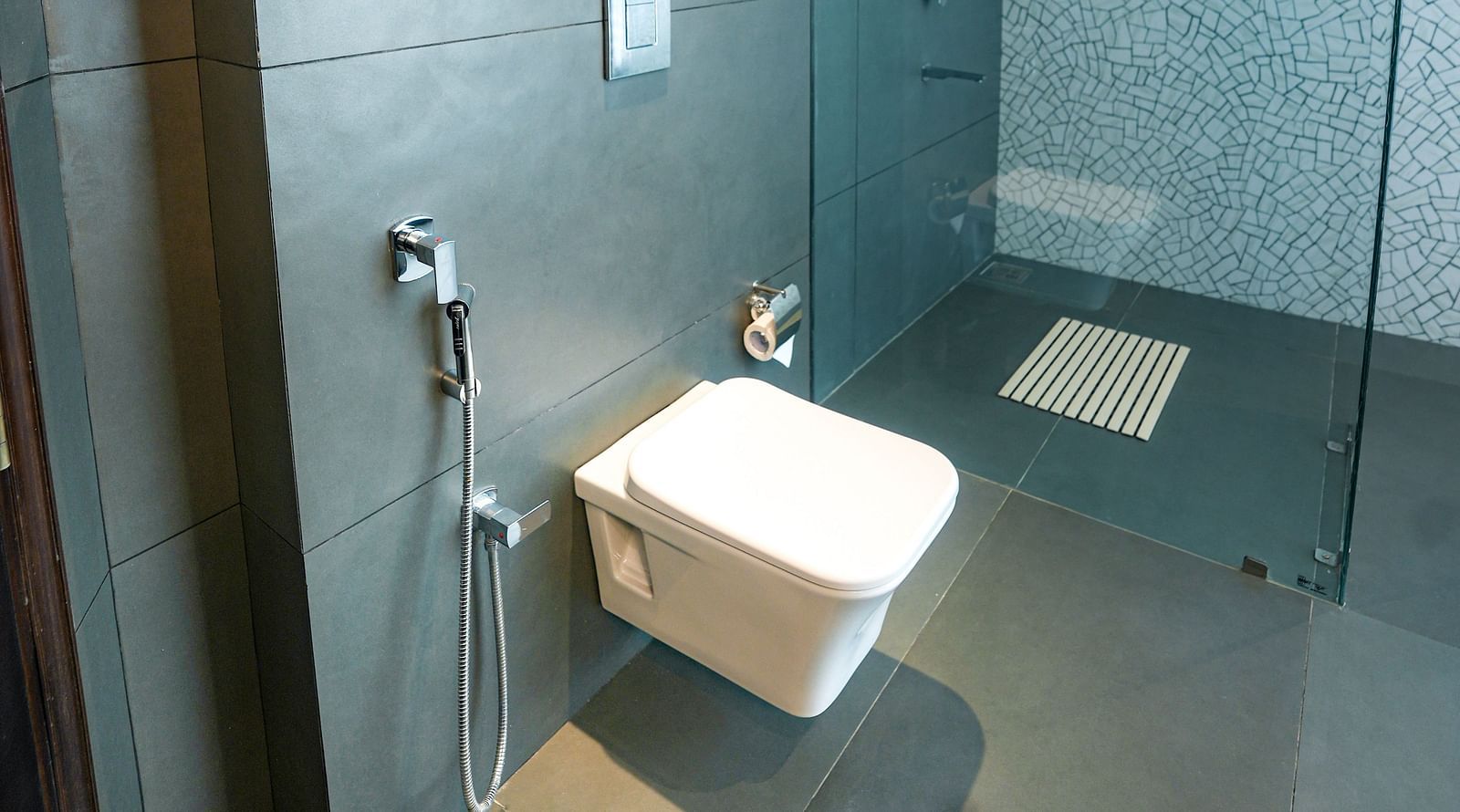 An image of a washroom with a commode and a separate shower cubicle - NAMAMI BY ZENQ BANKHANDI
