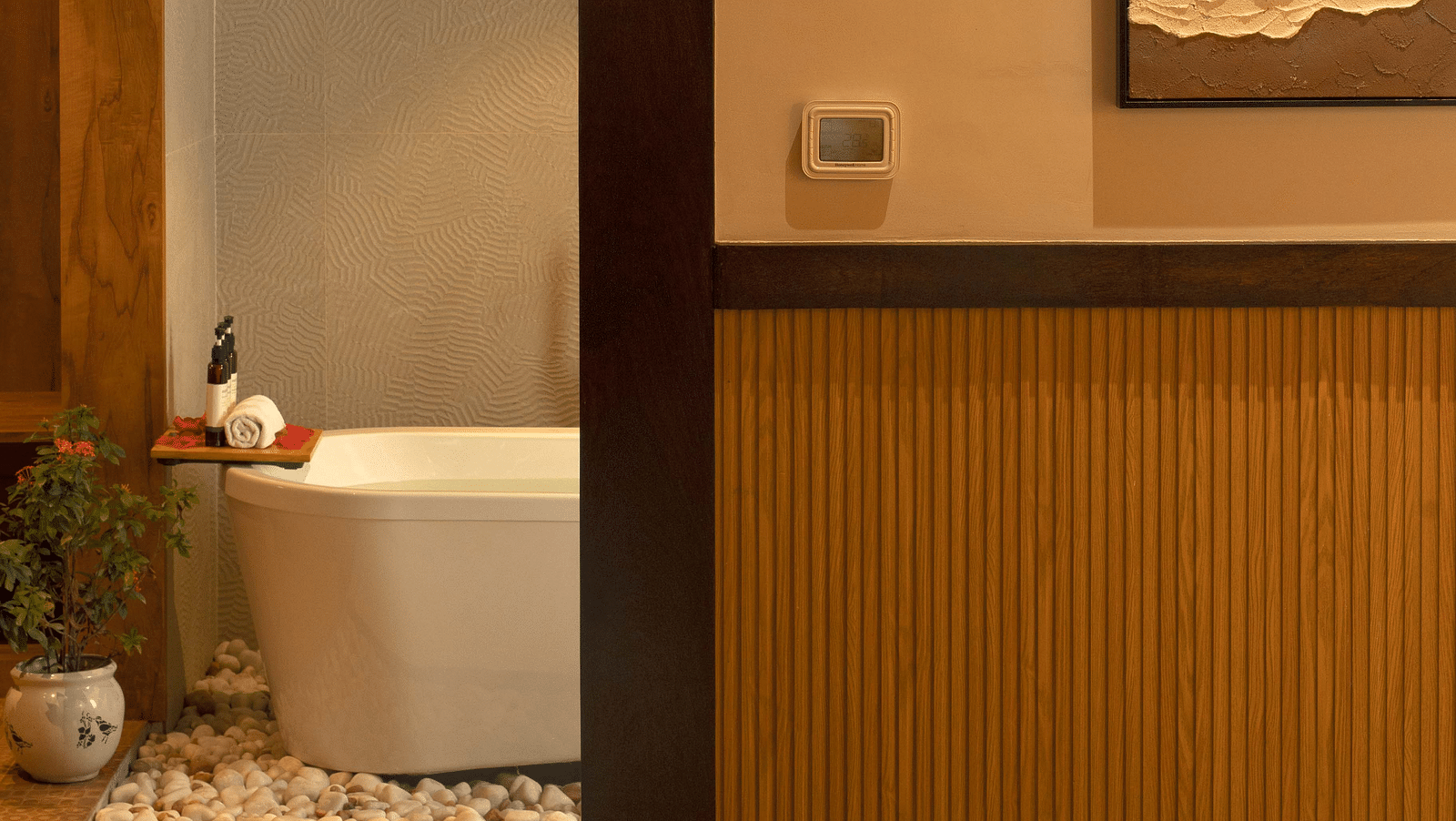 A glimpse of the battub from the bedroom of the Coral Teal Suite at Coral Reef Resort and Spa in Havelock