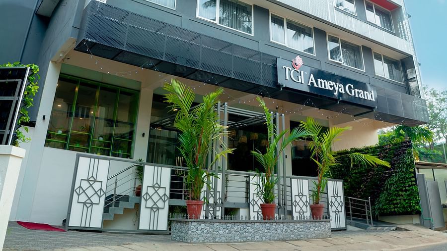 The front facade of the TGI Ameya Grand hotel in daylight - TGI Ameya Grand, Goa