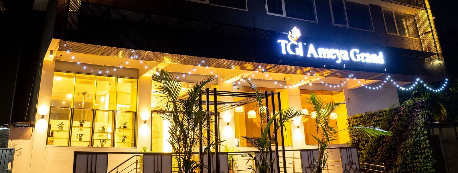 The TGI Ameya Grand hotel illuminated at night - TGI Ameya Grand, Goa