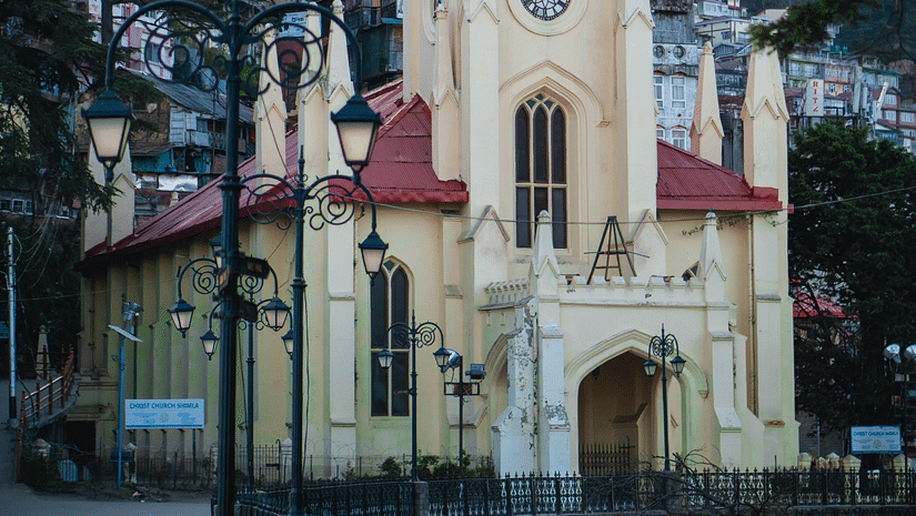 Facade of a church in Shimla with trees in the background
