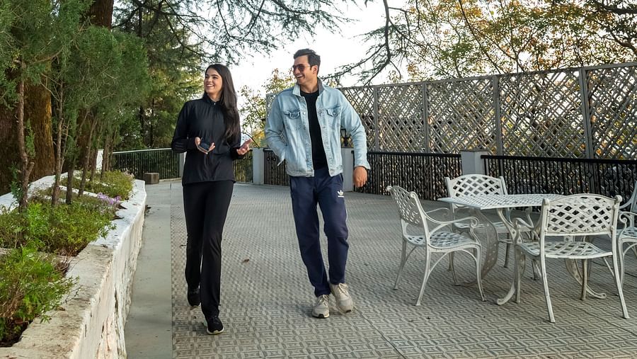 image of a couple walking around the property