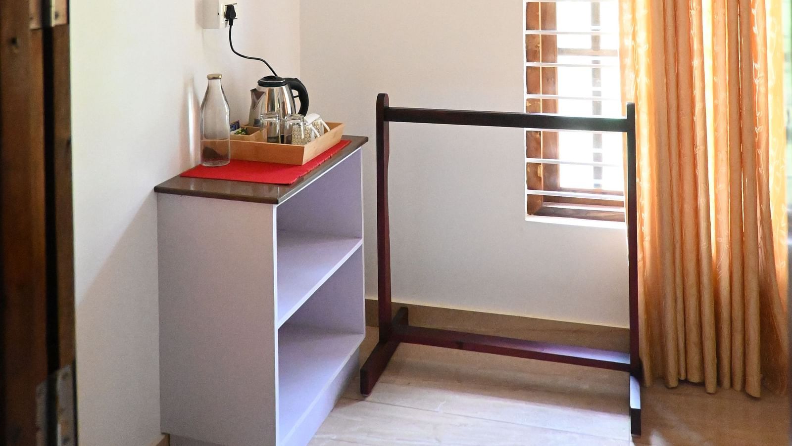 A traditional cloth hanger in one of the Rooms at Ananda Holiday Home, Wayanad 3