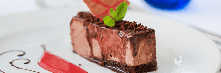 Beautifully plated pastry served with wine at The Soco House.