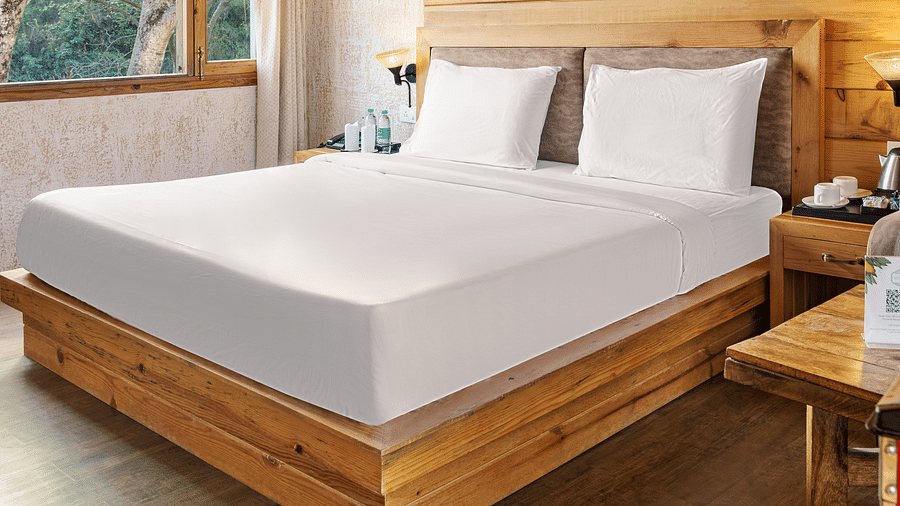 A view of the large bed at Pinewood Cottage at the Sylvan Retreat, Dehradun.