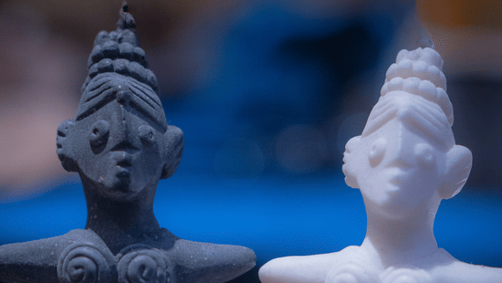 Wax statues displayed at Mother Wax Museum with dramatic lighting.