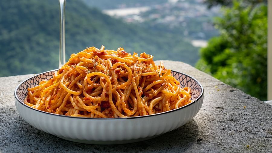 spaghetti served in a plate - Neer ganga Resorts