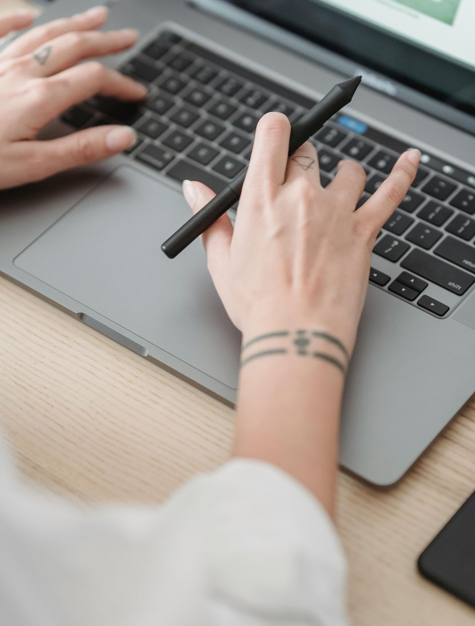 Image of a women working on a laptop.