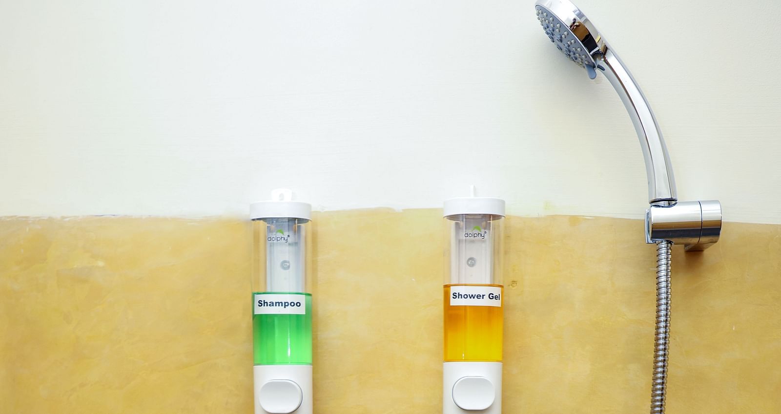 An image with a flexible shower, a faucet, and wall niches  | Mango Hill La Serene, Pondicherry