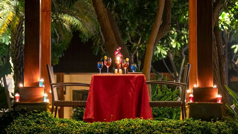 A  statue of Lord Ganesha reflected on the water body during dusk at our 5-star resort in Pushkar 