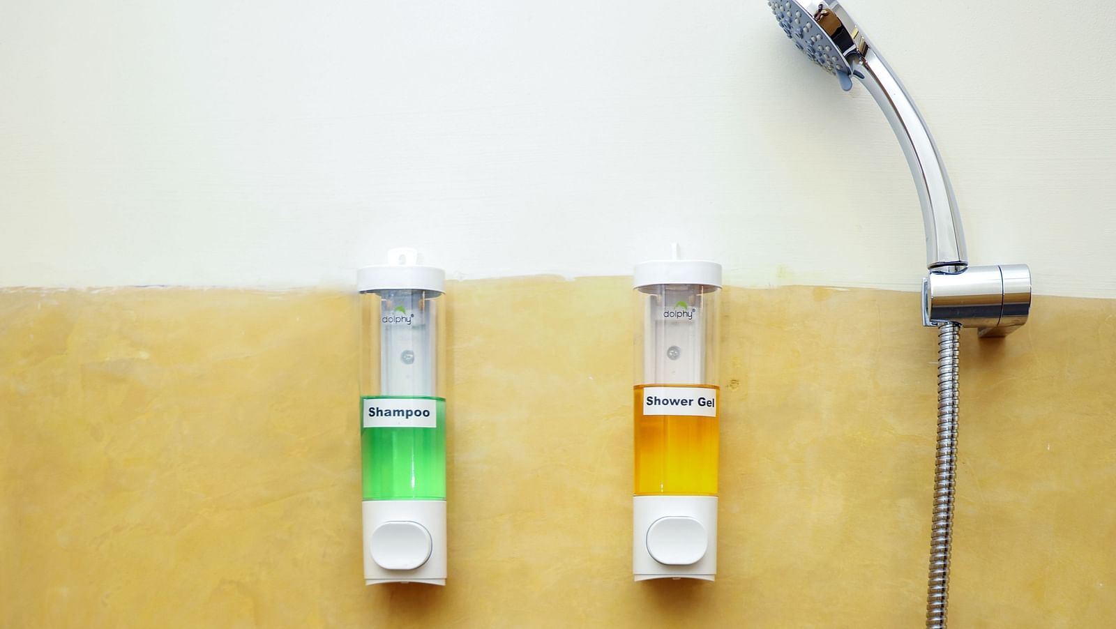 An image with a flexible shower, a faucet, and wall niches  | Mango Hill La Serene, Pondicherry