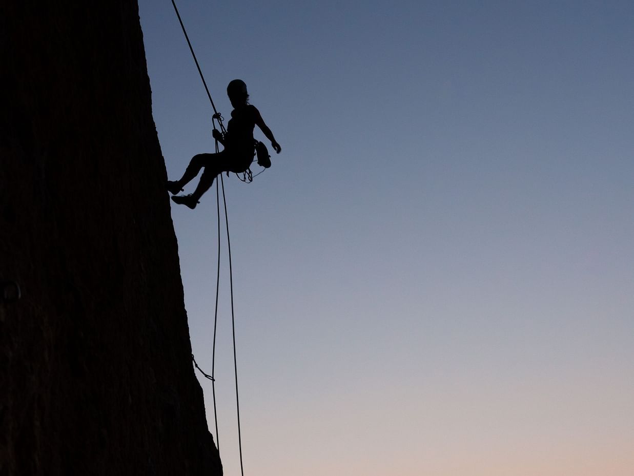 man doing rock climbing