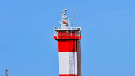 A lighthouse at Marina Beach in Chennai against the backdrop of clear blue sky - one of the places to visit in Chennai in 2 days itinerary.